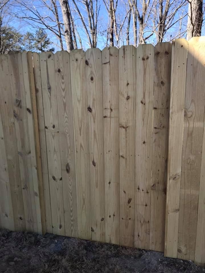 Close view of new vertical privacy fence boards